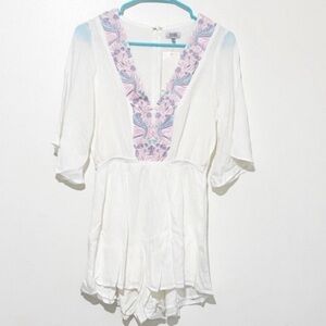 Tobi white romper with purple pastel embroidery v-neck